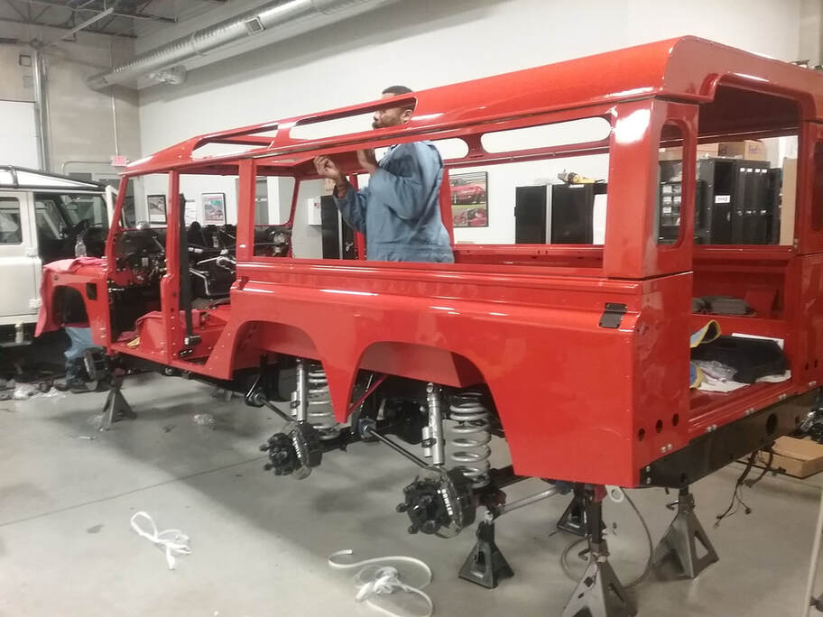 6 wheel drive Defender being prepared for a customer in America